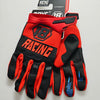 A pair of red and black cycling gloves for riding, shown flat against a white background.