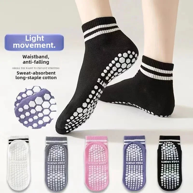 A set of non-slip grip socks in various colors and patterns for yoga and pilates