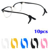 Un jeu de dix grips en silicone antidérapants pour lunettes, de différentes couleurs et formes.