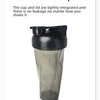 A clear plastic protein shaker bottle with a black sealed cap and measuring lines visible on the side.