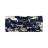 Navy blue fabric headband with a white floral vintage print