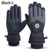 A pair of black ski gloves designed for winter sports and touchscreen use.