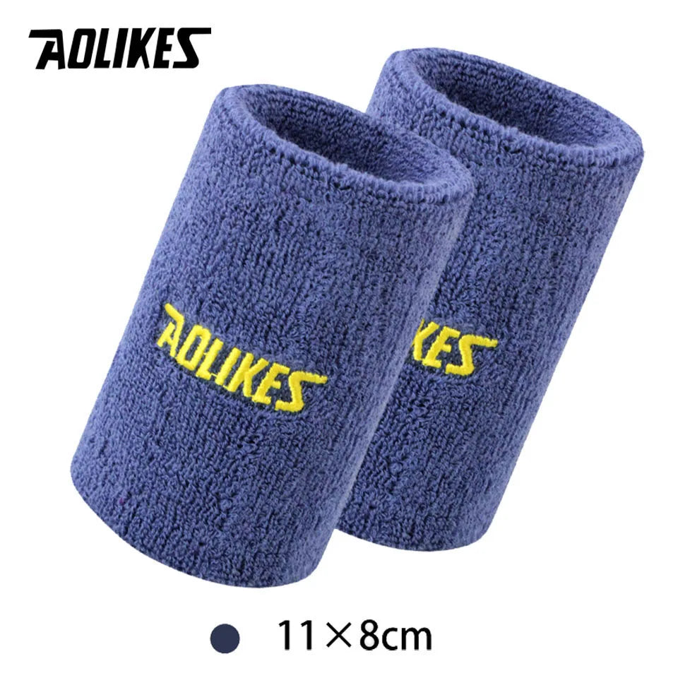A pair of dark blue knitted sport wristbands for activewear