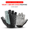 A pair of black velvet SBR anti-shock palm pads for cycling gloves in gray.