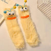 Pair of funny plush caterpillar floor socks with yellow fur and blue and orange accents