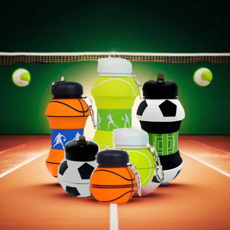 A collection of colorful foldable silicone sports water bottles arranged on a wooden sports court.