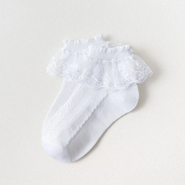 Calcetines de encaje blanco con volantes delicados y textura suave para niñas