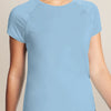 A light blue women's quick dry moisture-wicking gym t-shirt being worn by a model.