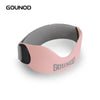 A pink and gray silicone knee support strap worn on the leg.