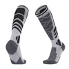Par de calcetines térmicos de lana merino gris y negro para deportes de invierno