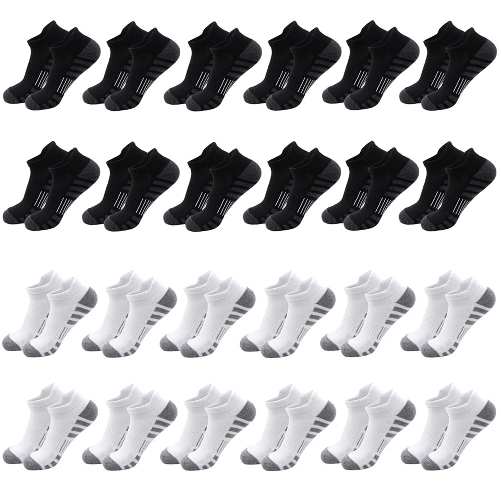 A set of black ankle athletic running socks for men and women displayed in a row.