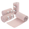 Rolls of pink elastic skin tone tendon bandages with metal clasps