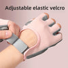 Pink adjustable elastic velcro gloves being worn on a hand