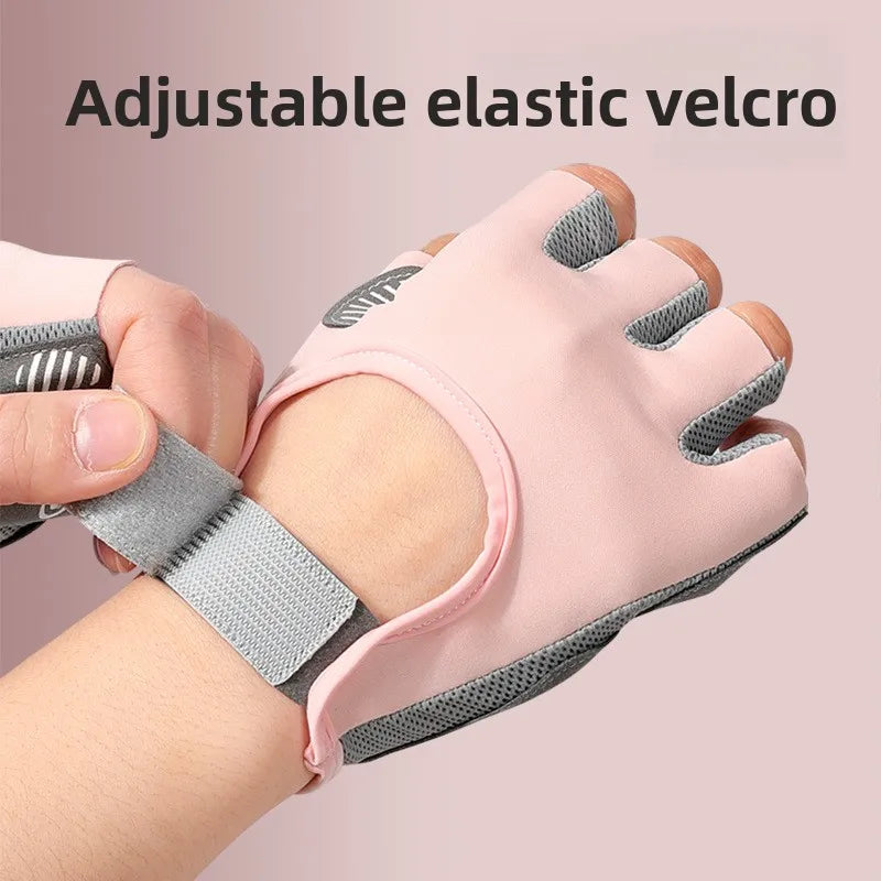 Pink adjustable elastic velcro gloves being worn on a hand