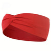 A red knitted elastic sports headband is shown rolled and knotted, ready for workouts or everyday wear.