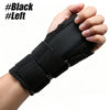 A hand is holding a black wrist splint or brace, showing the left side of the device.