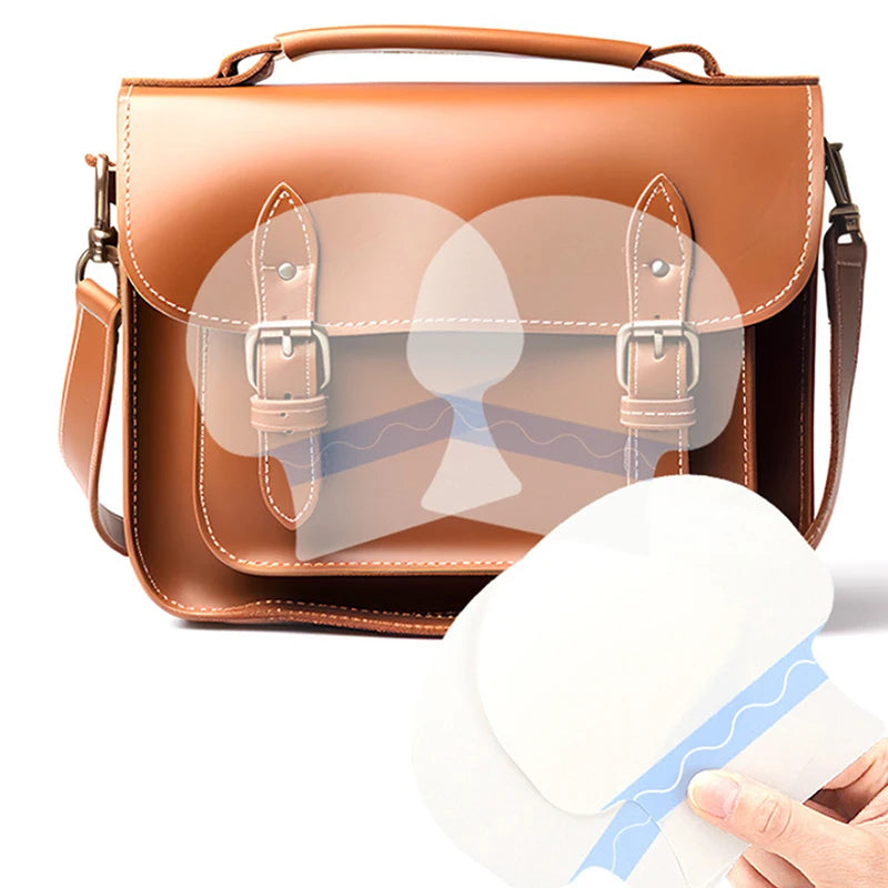 A brown leather cosmetic bag with a flap, showing an invisible body shaping patch.