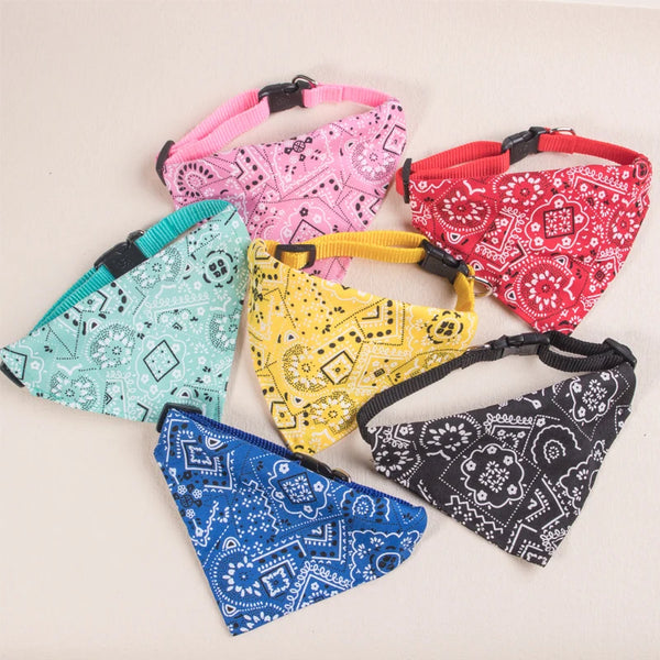 A collection of colorful, patterned adjustable pet scarves for dogs and kittens.
