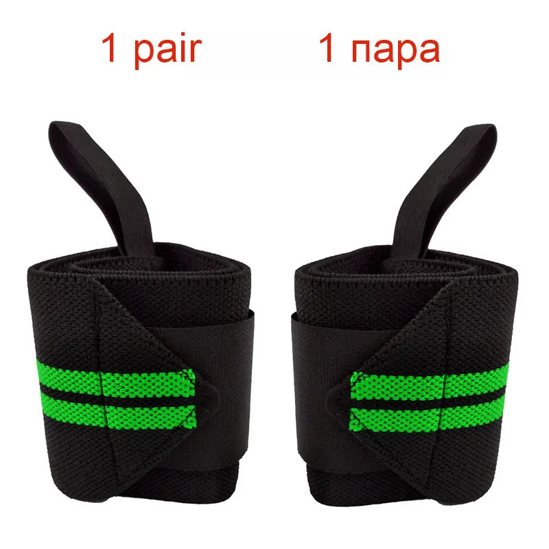 A pair of black heavy duty wrist wraps with neon green stripes shown from the side.