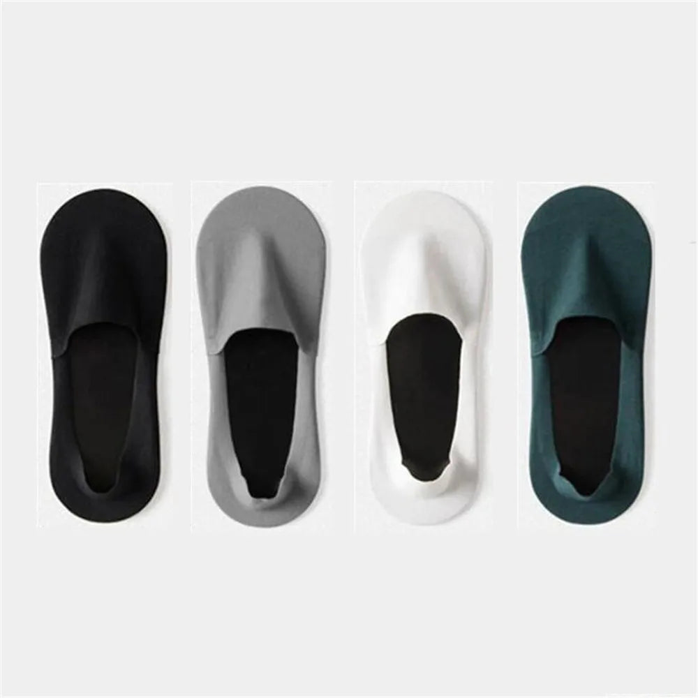 Four pairs of men's invisible boat socks in black, gray, white, and dark green.