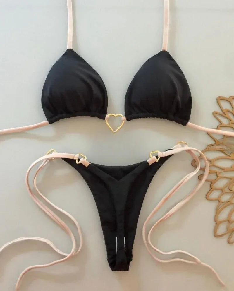 Black halter bikini set for women displayed on a light background