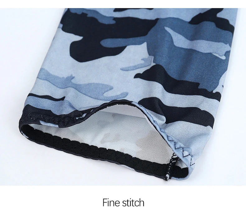 Gray and black camouflage sun protection arm sleeves shown flat
