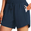 Navy women's quick-dry sports running shorts worn by a model