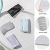 A collection of gray and light blue elastic sports headbands shown with close-ups detailing soft fabric and delicate stitchin