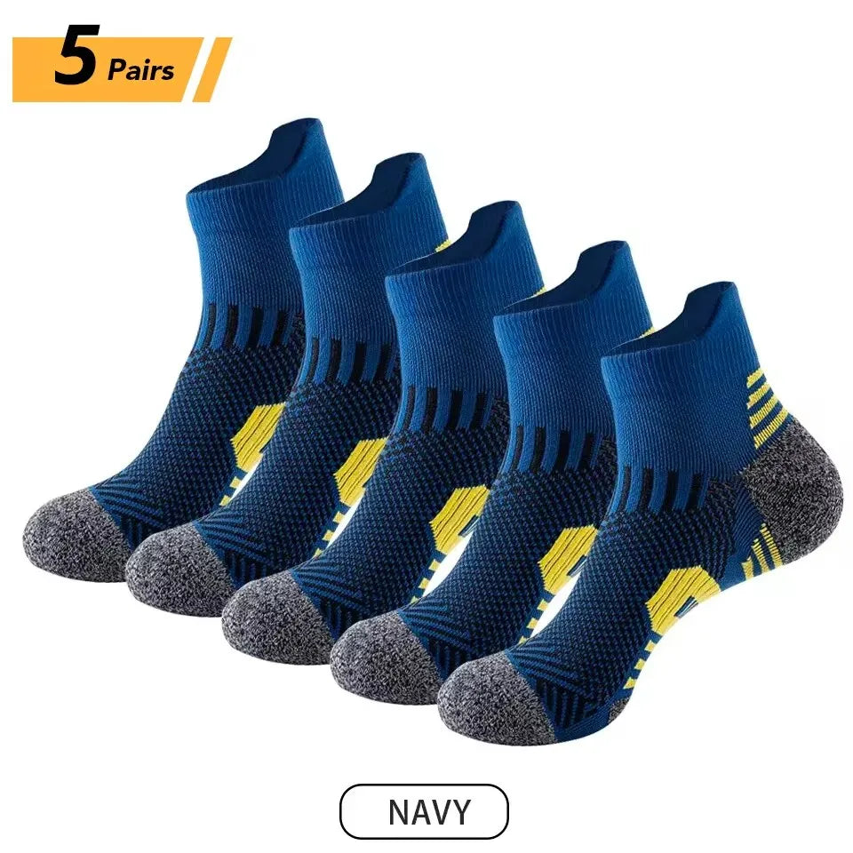Five pairs of navy blue men's performance running and sport socks displayed flat.