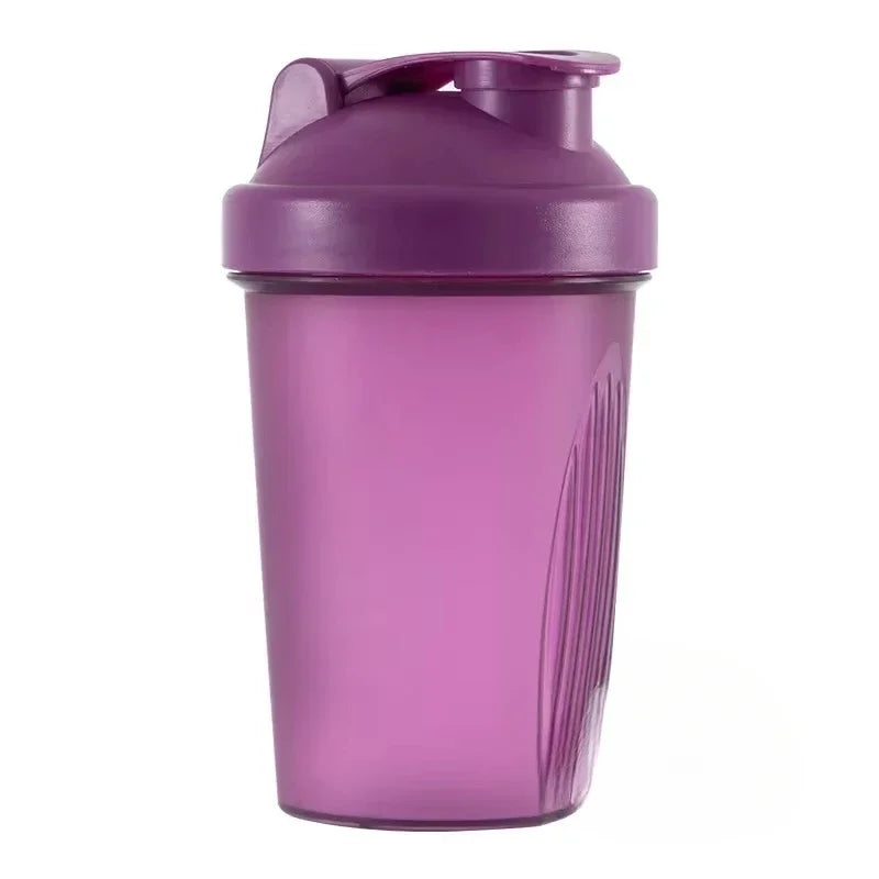 A purple portable protein shaker bottle with a sealed cap and textured body.