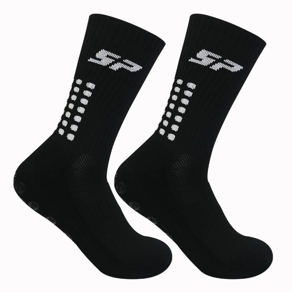Une paire de chaussettes de football noires antidérapantes avec marquage blanc