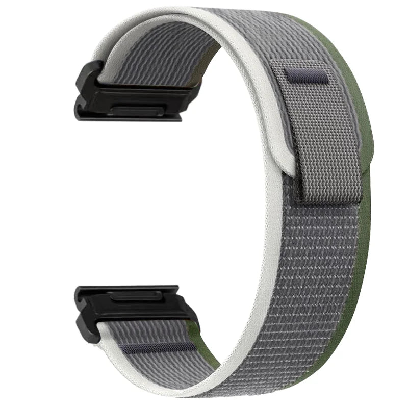 A close-up view of a gray and white adjustable nylon strap for a sports watch.