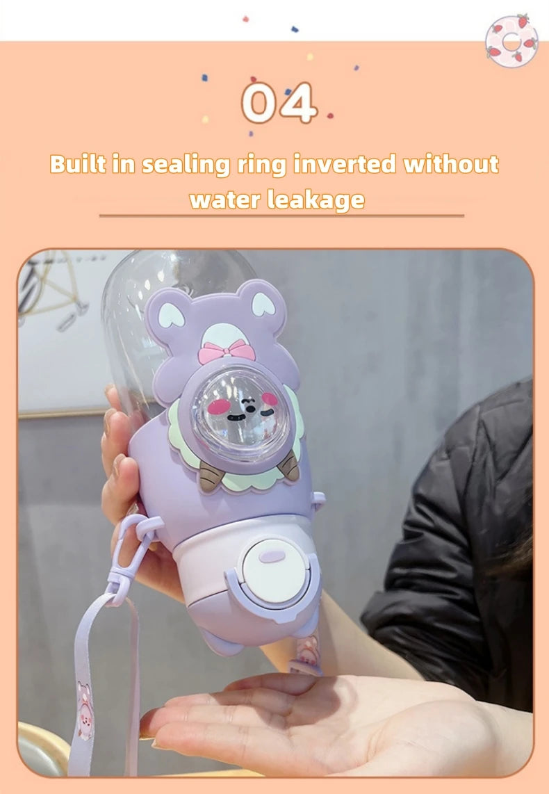 A purple cartoon animal water bottle is shown being held, demonstrating its sealing ring feature.
