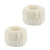 A set of white microfiber spa headband and wristband, fluffy texture.
