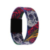 A black and red patterned stretch silicone wristband bracelet featuring skull designs.