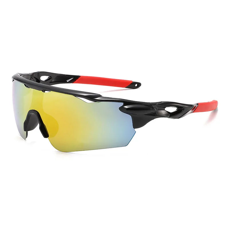 A pair of black sports sunglasses with orange accents and yellow-tinted lenses.