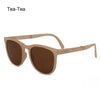 Brown vintage oversized retro sunglasses with light wood frames and dark lenses