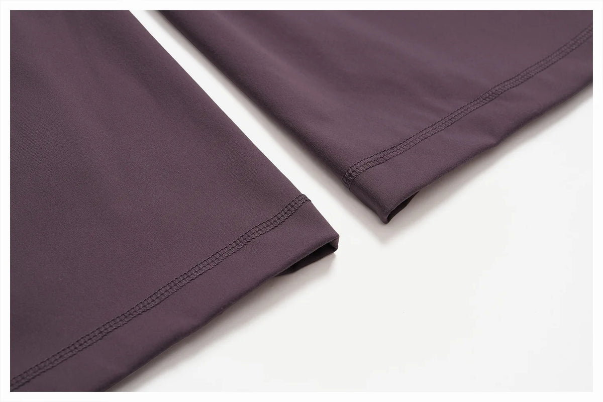 A close-up view of a mauve high-waist wide-leg yoga legging fabric.
