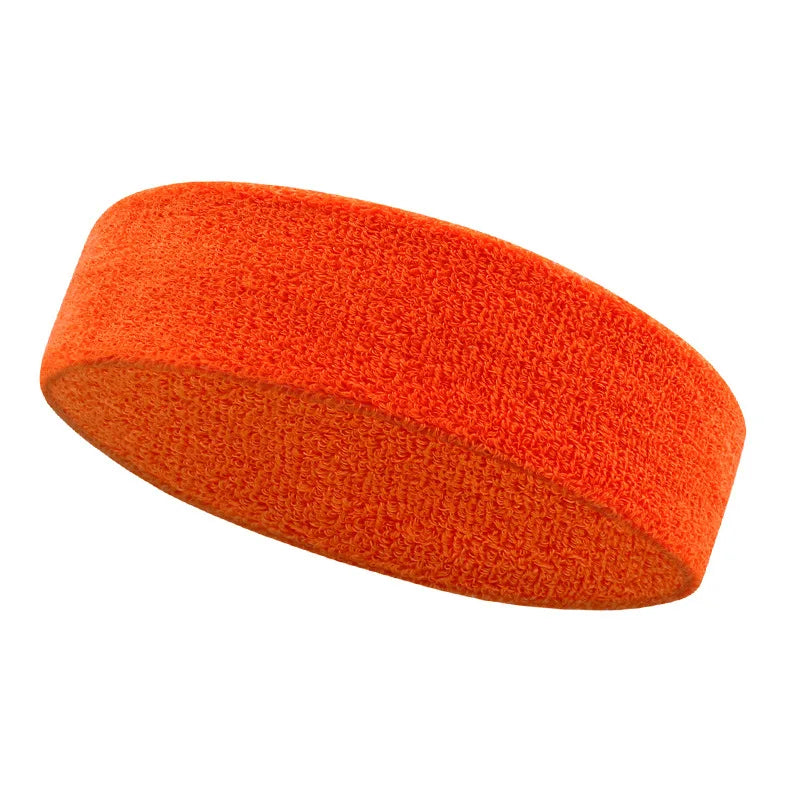 Orange moisture-wicking athletic headband shown from the side.