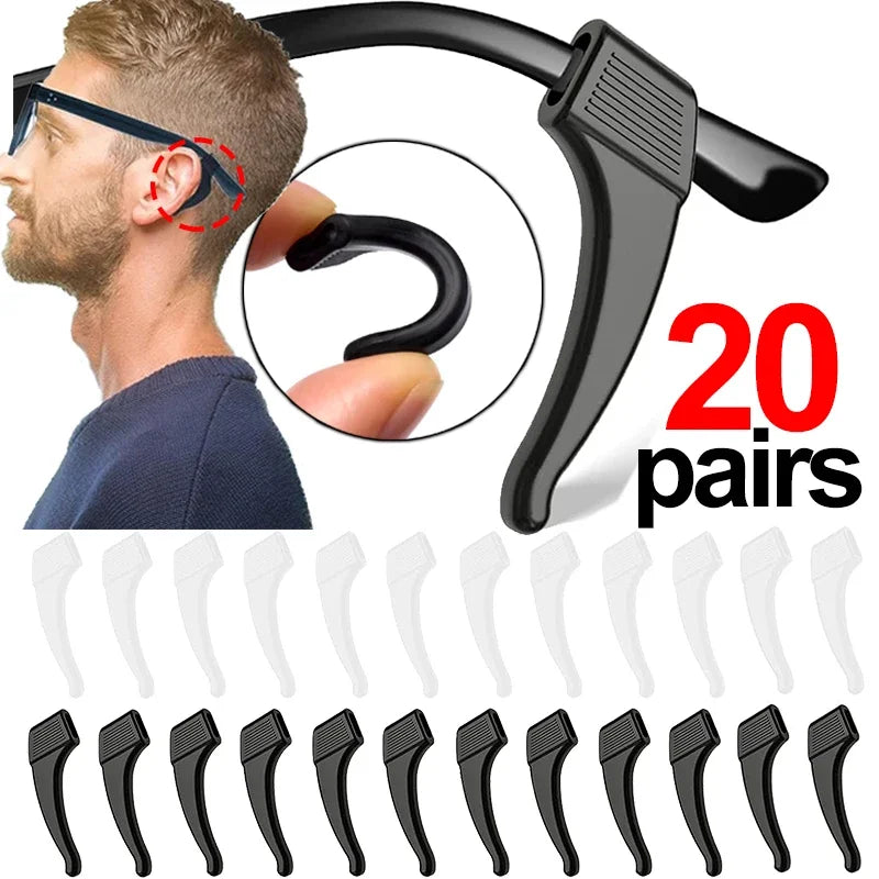 A set of black silicone ear hooks for eyeglasses, showing various sizes and angles.