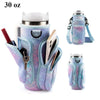 A light blue patterned fabric carrier bag designed to hold and protect a stainless steel tumbler or water bottle.