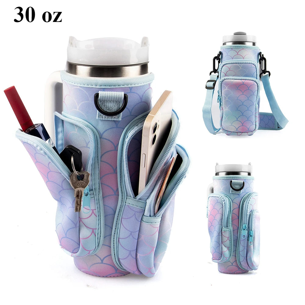 A light blue patterned fabric carrier bag designed to hold and protect a stainless steel tumbler or water bottle.