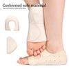 A person's foot wearing a beige gel heel cup for pain relief, with separate silicone components shown.