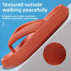A close-up view of an orange textured outsole walking peacefully, with a circular rubber pad shown separately.