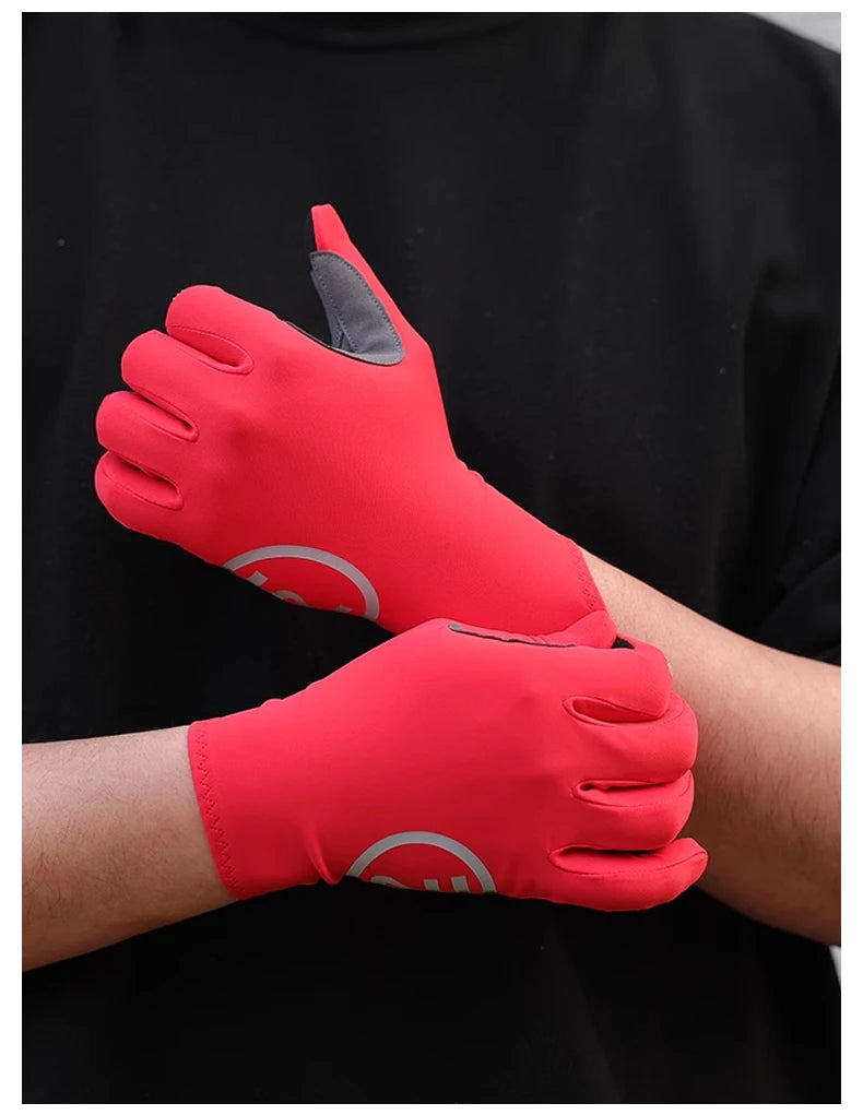 A close-up of a red cycling glove with silicone palm pads being worn on a hand against a black shirt.