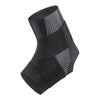 Black adjustable ankle support brace with a textured and dotted pattern.