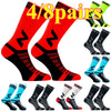 A set of four pairs of high-quality compression cycling socks in red and black designs.