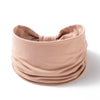 A beige boho wide headband hair wrap for women shown in a close-up view.