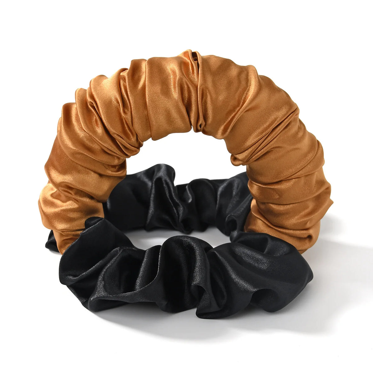 A headband made of satin fabric in shades of gold and black, used for heatless curling.