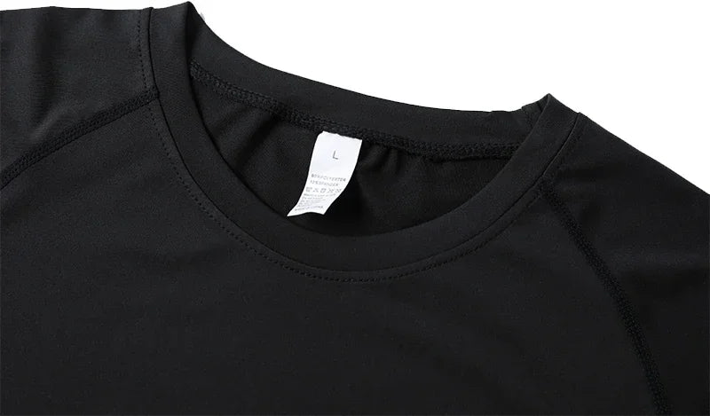 Black men's performance compression t-shirt shown flat lay
